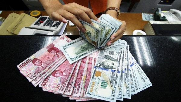 Ilustrasi rupiah dan dolar AS-1633336741