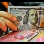Ilustrasi - Lembaran mata uang rupiah dan dolar AS. ANTARA FOTO/Puspa Perwitasari/aa.-1670901540