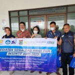 Kunjungan dosen UMN ke pasar dalam sosialisasi aplikasi Sasar.-1671518685