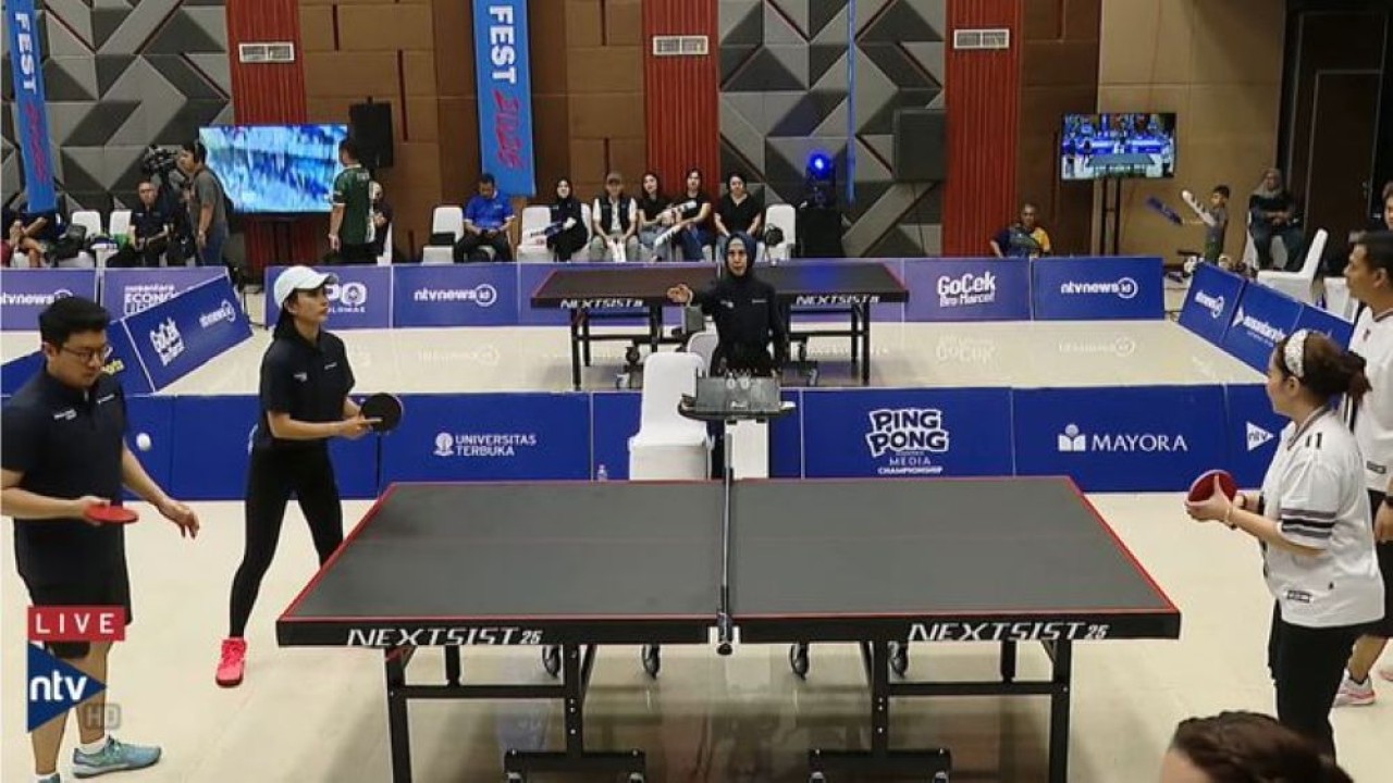Abraham Silaban/Desmona Chandra, harus puas finis sebagai runner up setelah takluk dari pasangan Metro TV, Rizky/Yohana, dalam final Ping Pong Nusantara Media Championship.